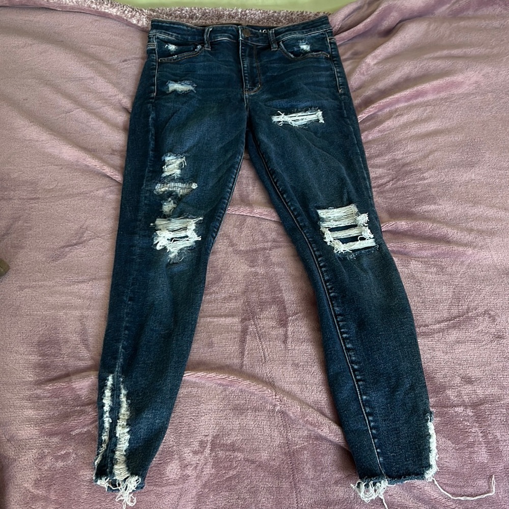 American eagle jeans, style has covered rips and in great condition